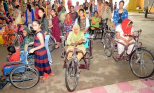 tricycles distribution to the needy daily bees