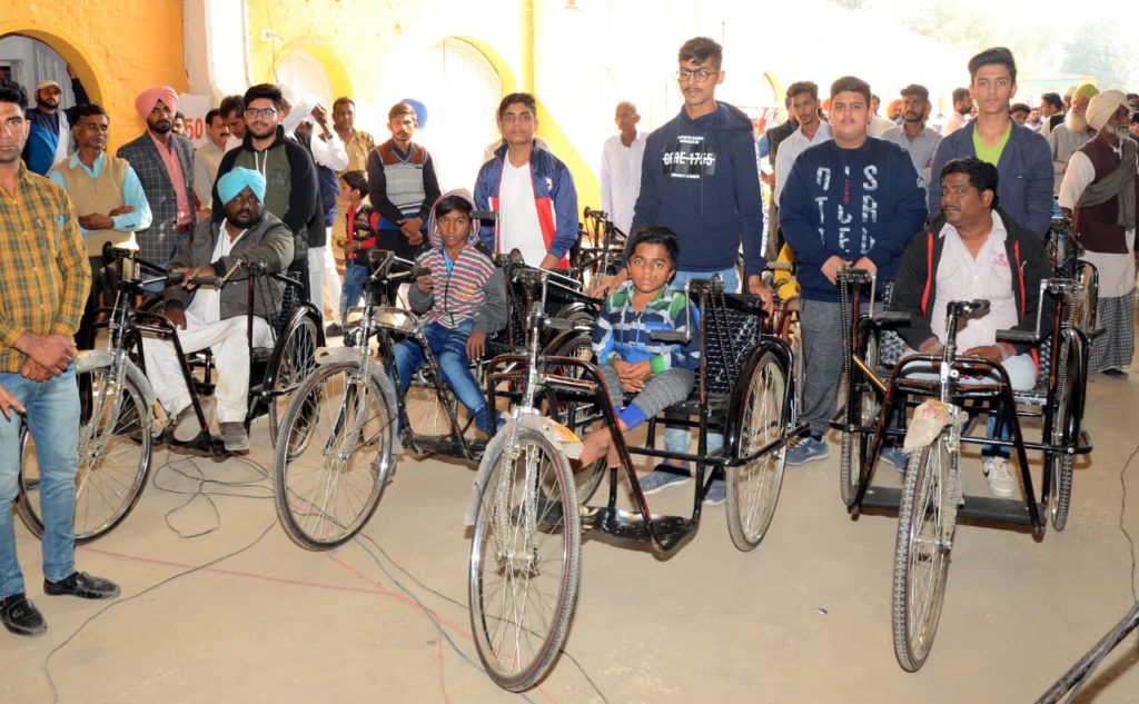 tricycles distribution at DSS Sirsa Daily Bees