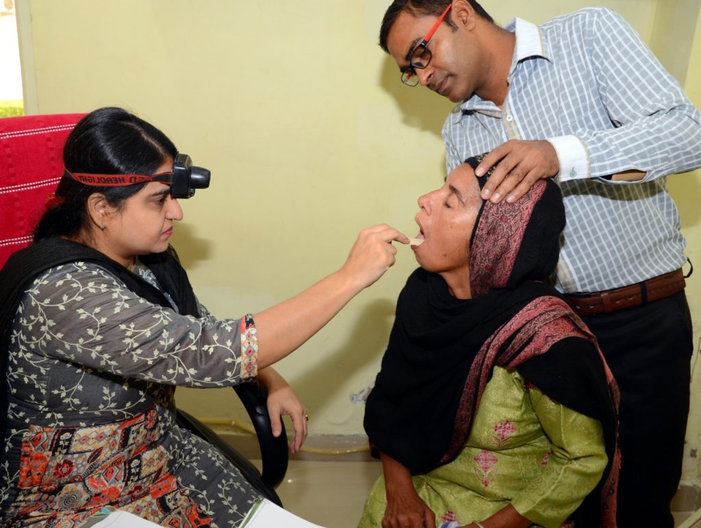 ENT Doctor checking patient at DSS Sirsa Daily Bees